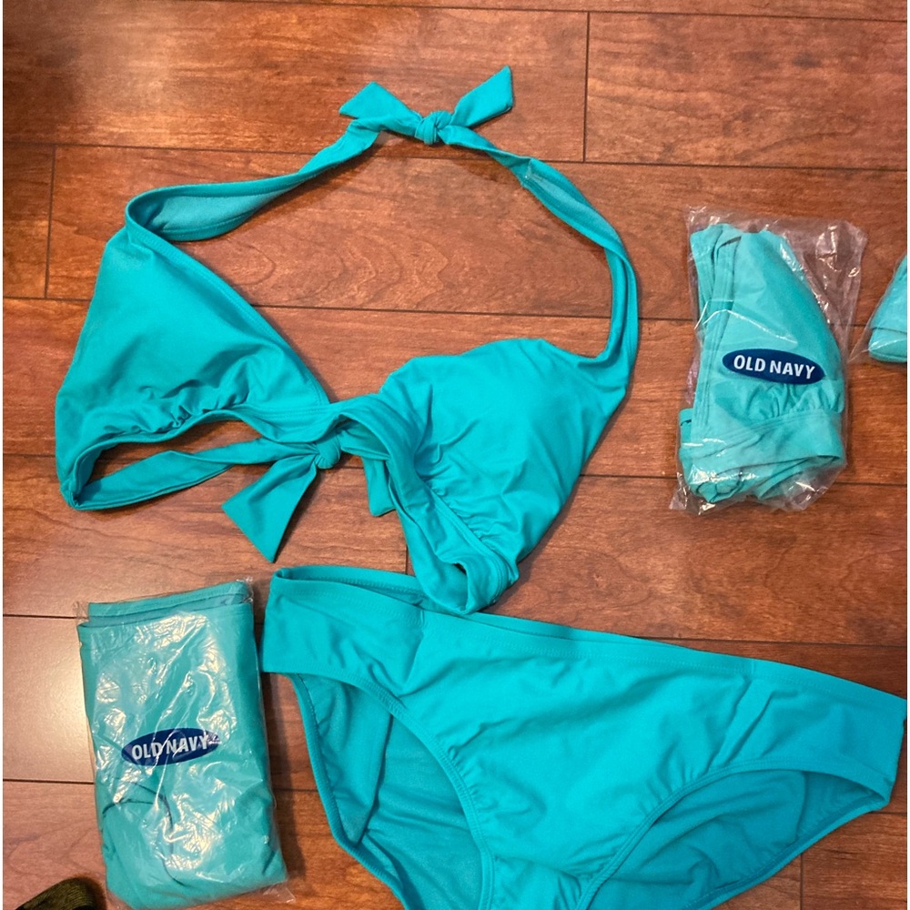 NEW. (3)  LOTNEW SETS WOMENS SUIT. Old Navy. Two skirt bottoms, one bikini botto